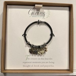 Brand new Demdaco Giving Cross Bracelet